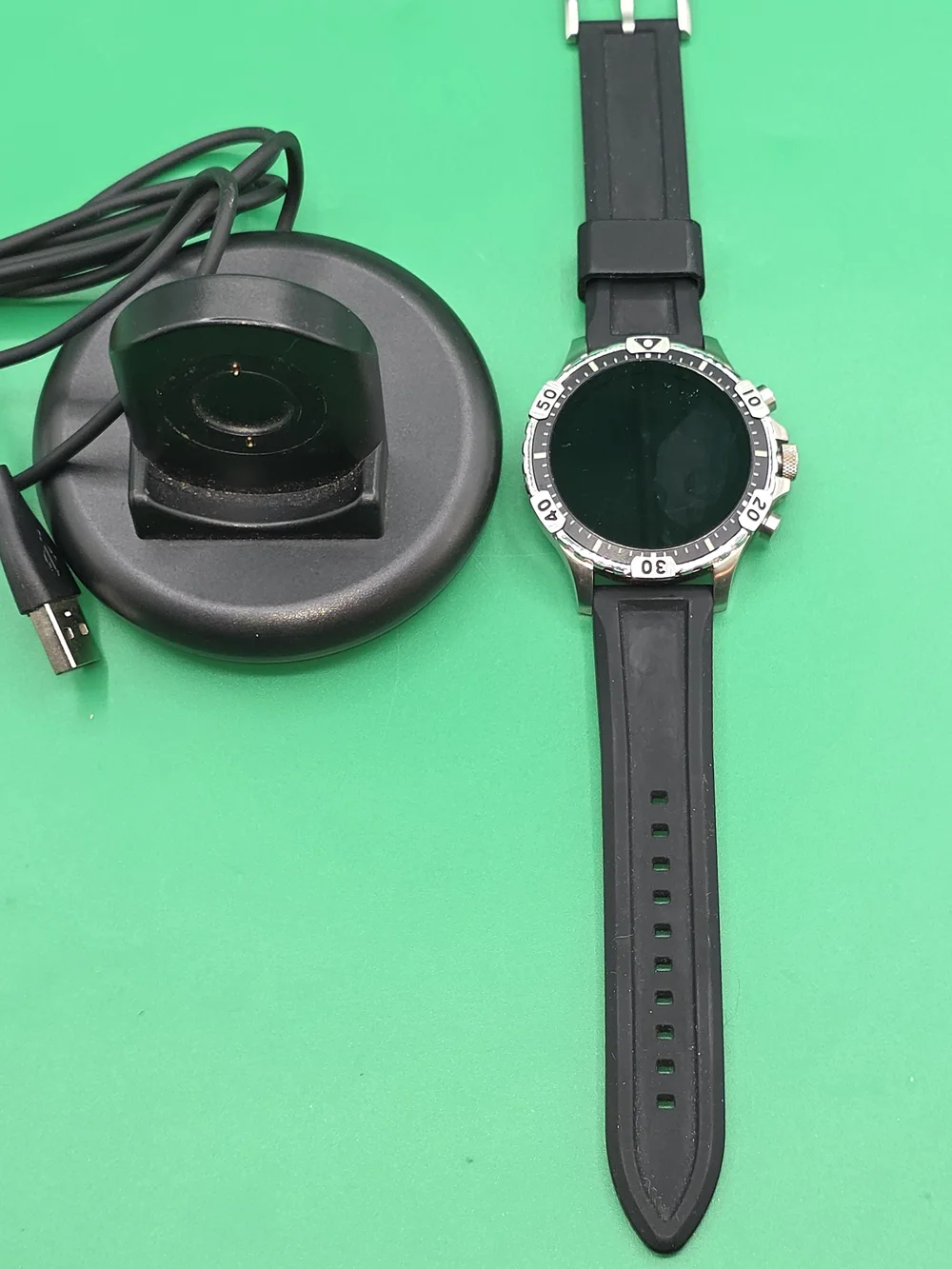Fossil Gen 5 Garrett HR smartwatch with a black silicone strap
